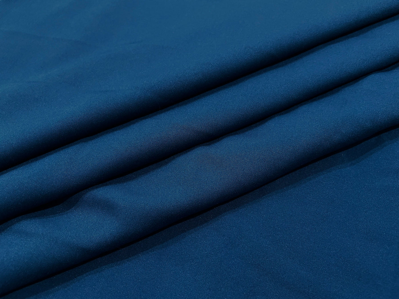 Peacock Blue Plain Butter Crepe Fabric