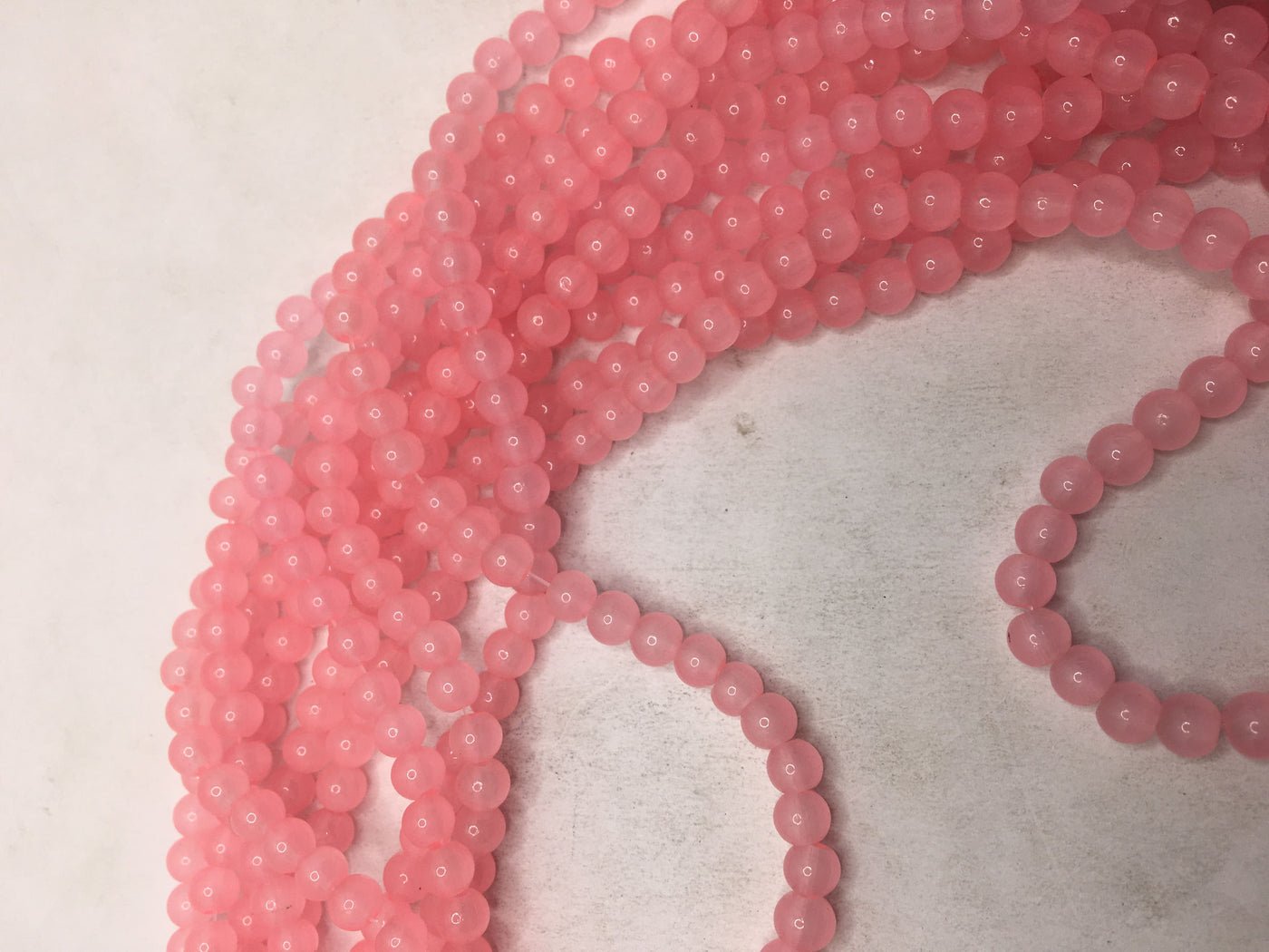 Bright Pink Spherical Glass Beads