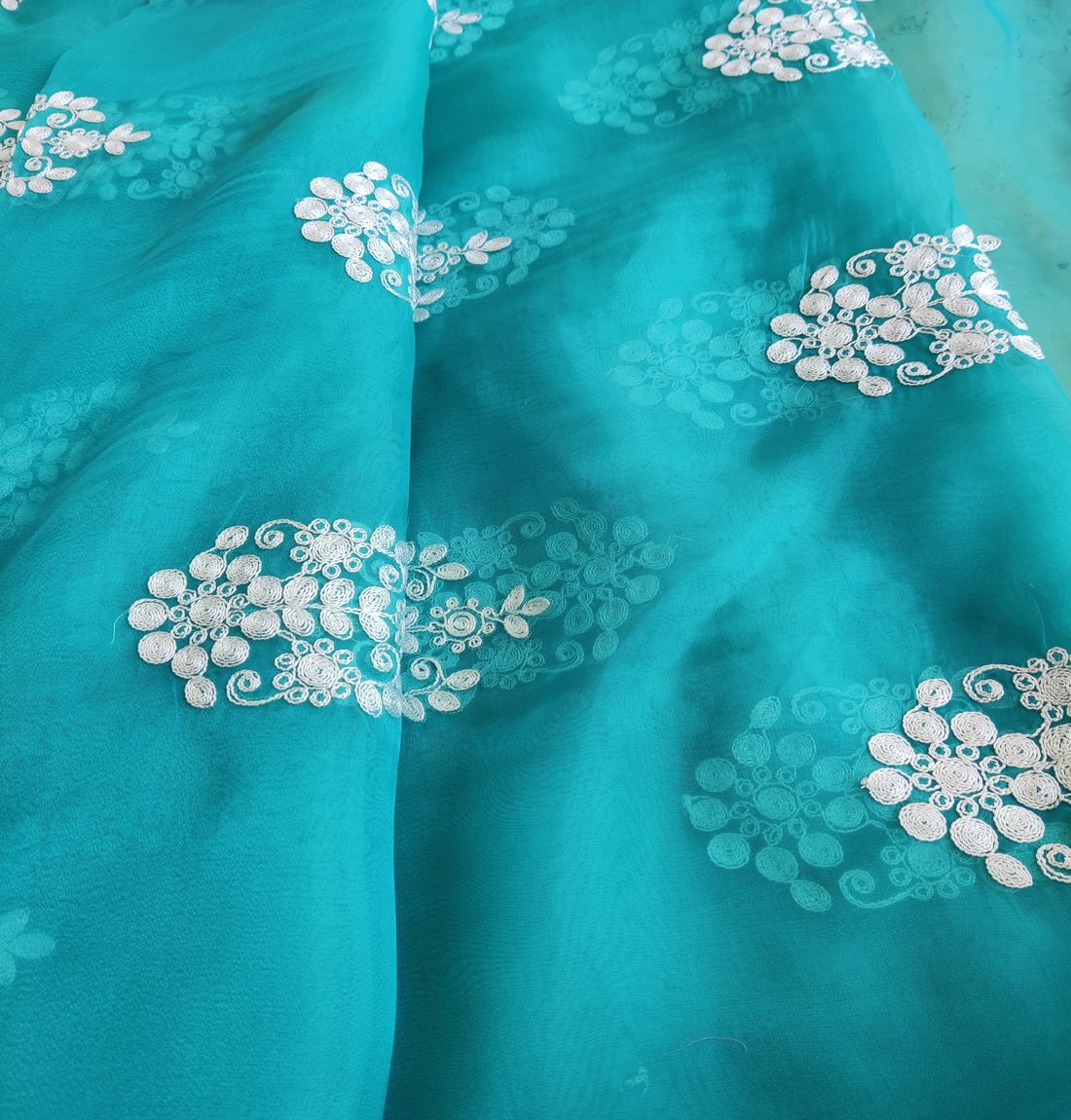 Teal Green Motifs Organza With White Dori Fabric