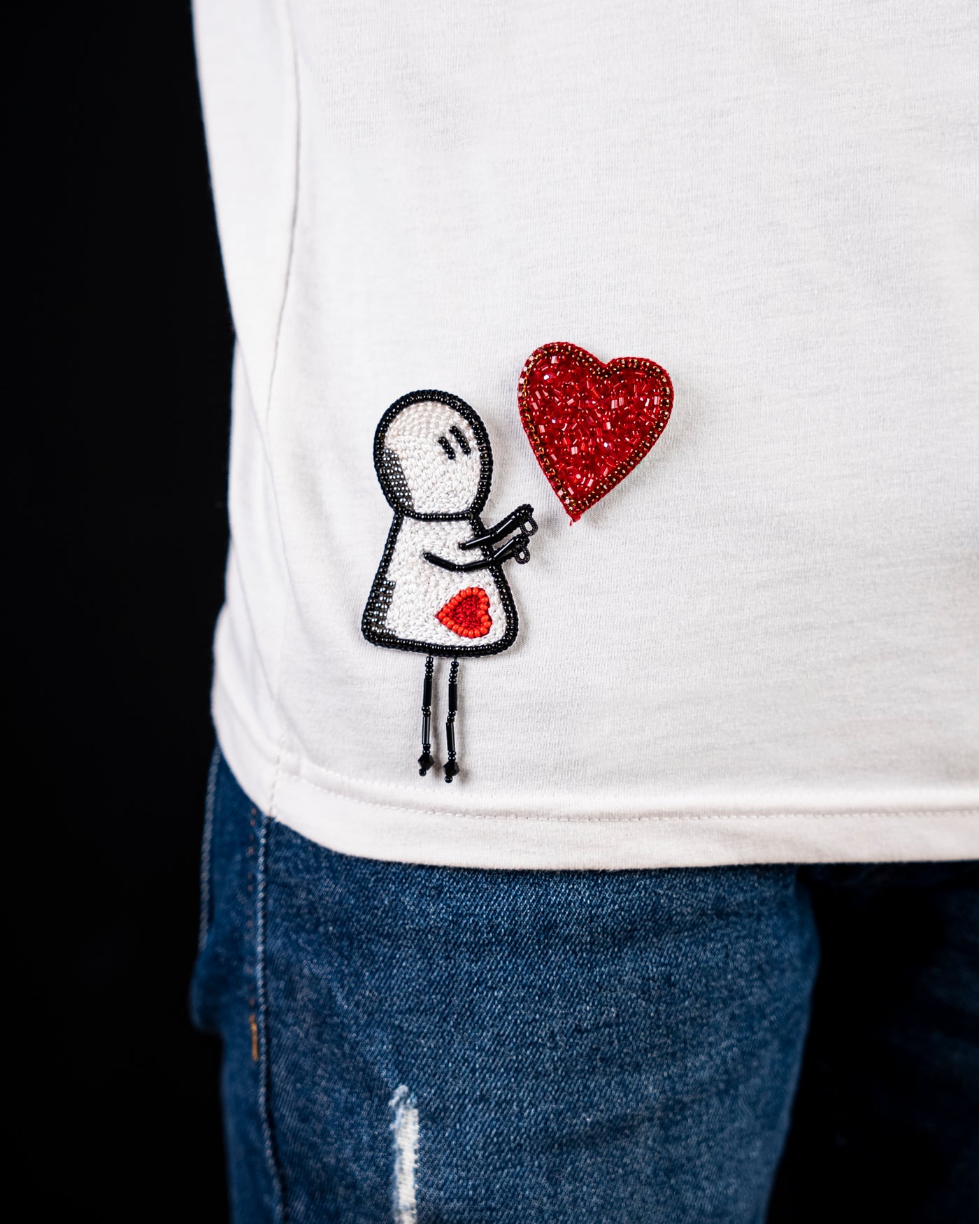 Red and Black Man With A Heart Patch