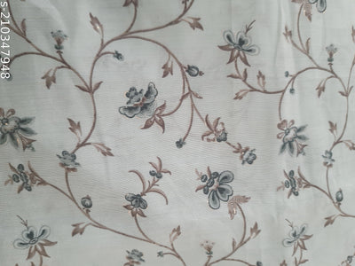 हल्का क्रीम पुष्प मुद्रित मलमल कपड़ा