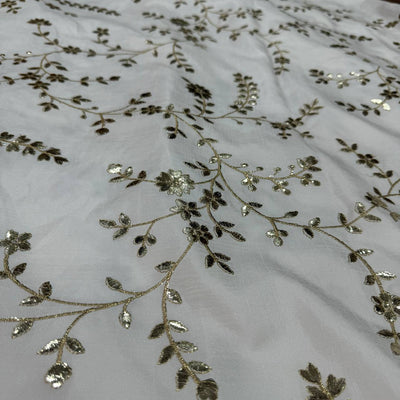 White Floral Dyeable Zari Foil Embroidered Viscose Dola Silk Fabric