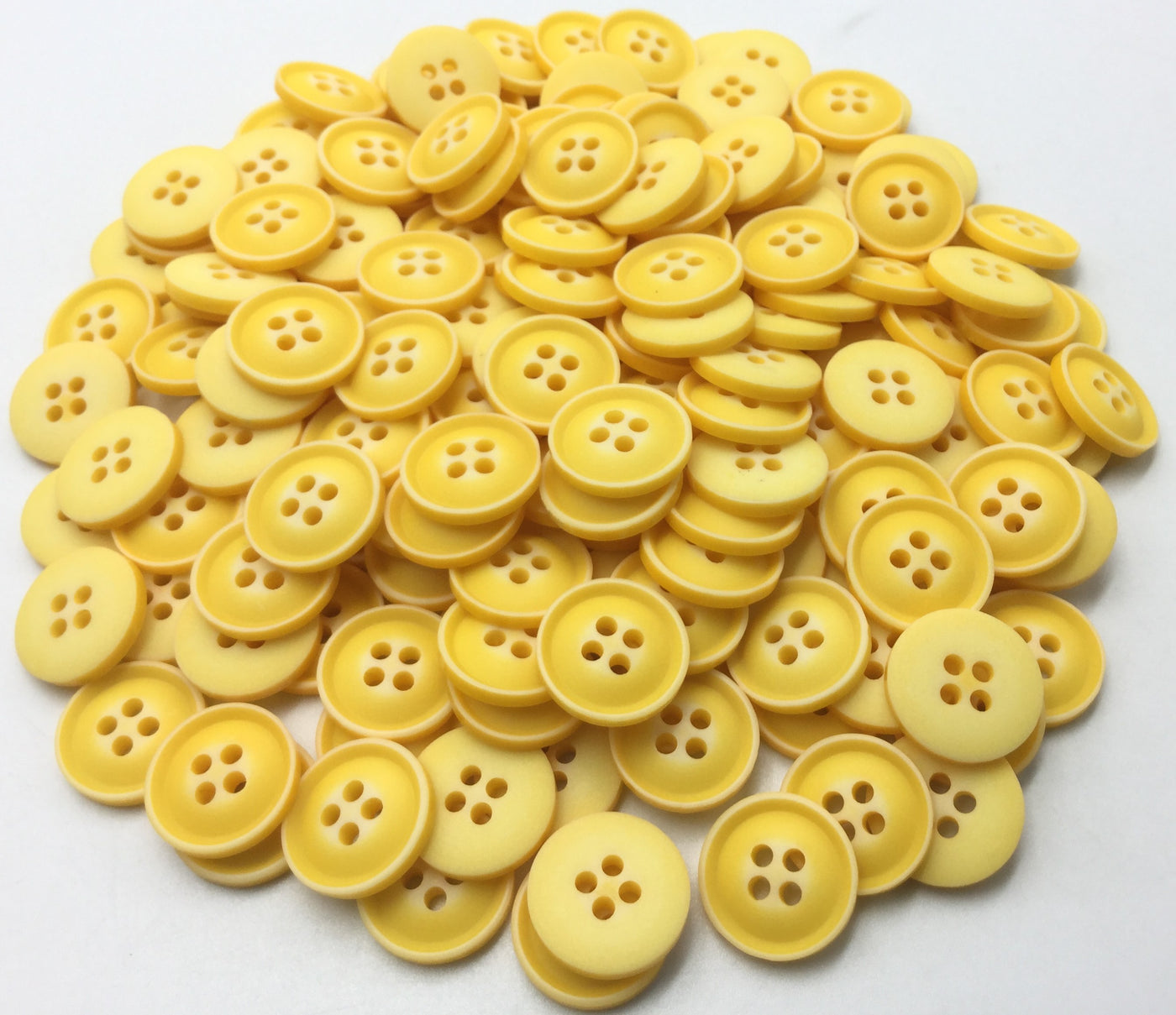 Yellow Circular Plastic Buttons