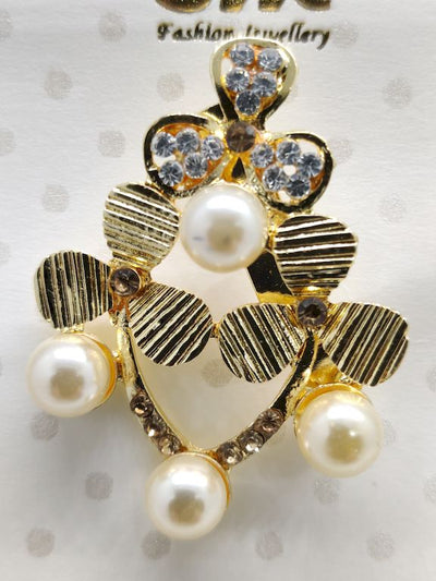 golden-fan-design-with-pearl-brooch