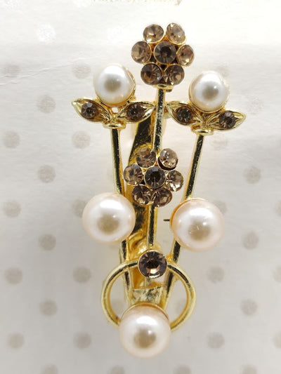 golden-flower-with-pearl-brooch