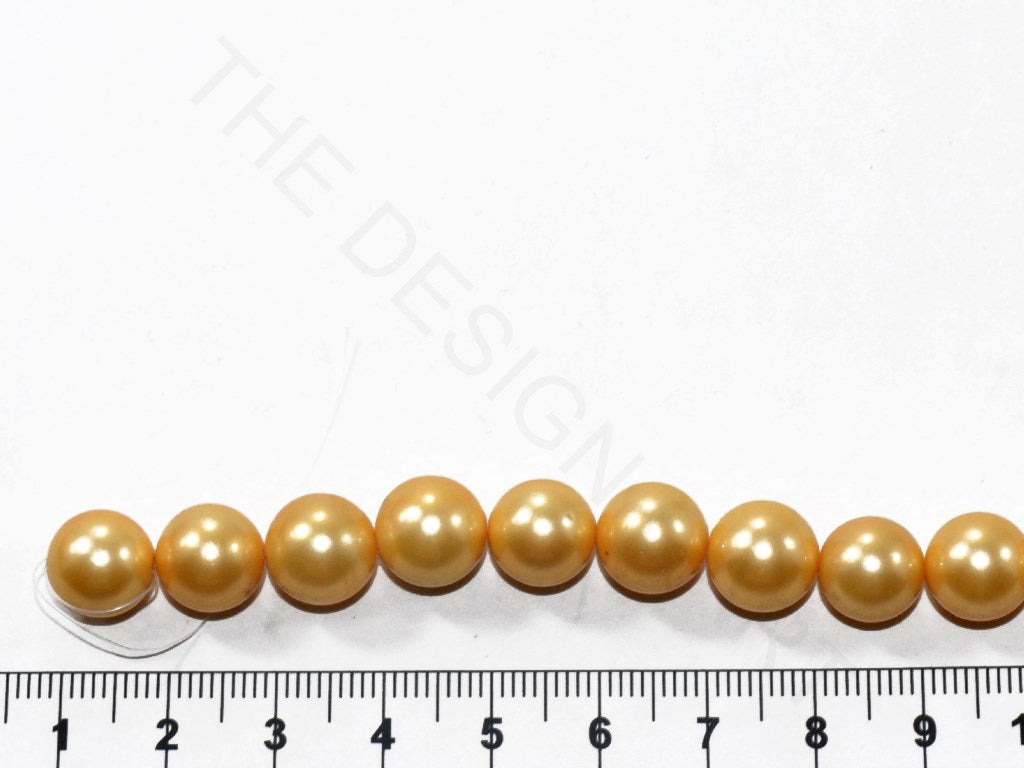 Golden Round Shell Pearls (10 mm) | The Design Cart (3785192996898)