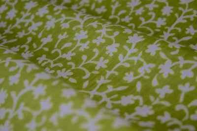 olive-green-floral-printed-pure-cotton-fabric