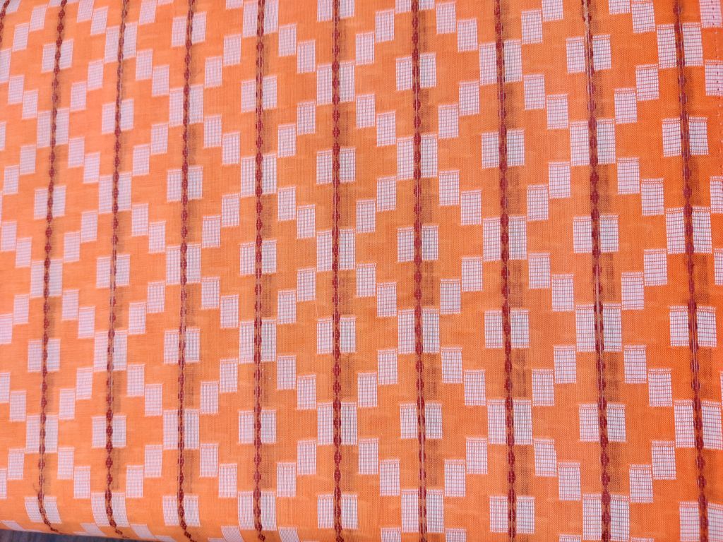 light-orange-self-patterned-ikkat-cotton-fabric