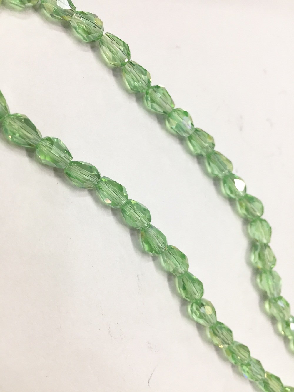 light-green-transparent-drop-shaped-crystal-glass-beads