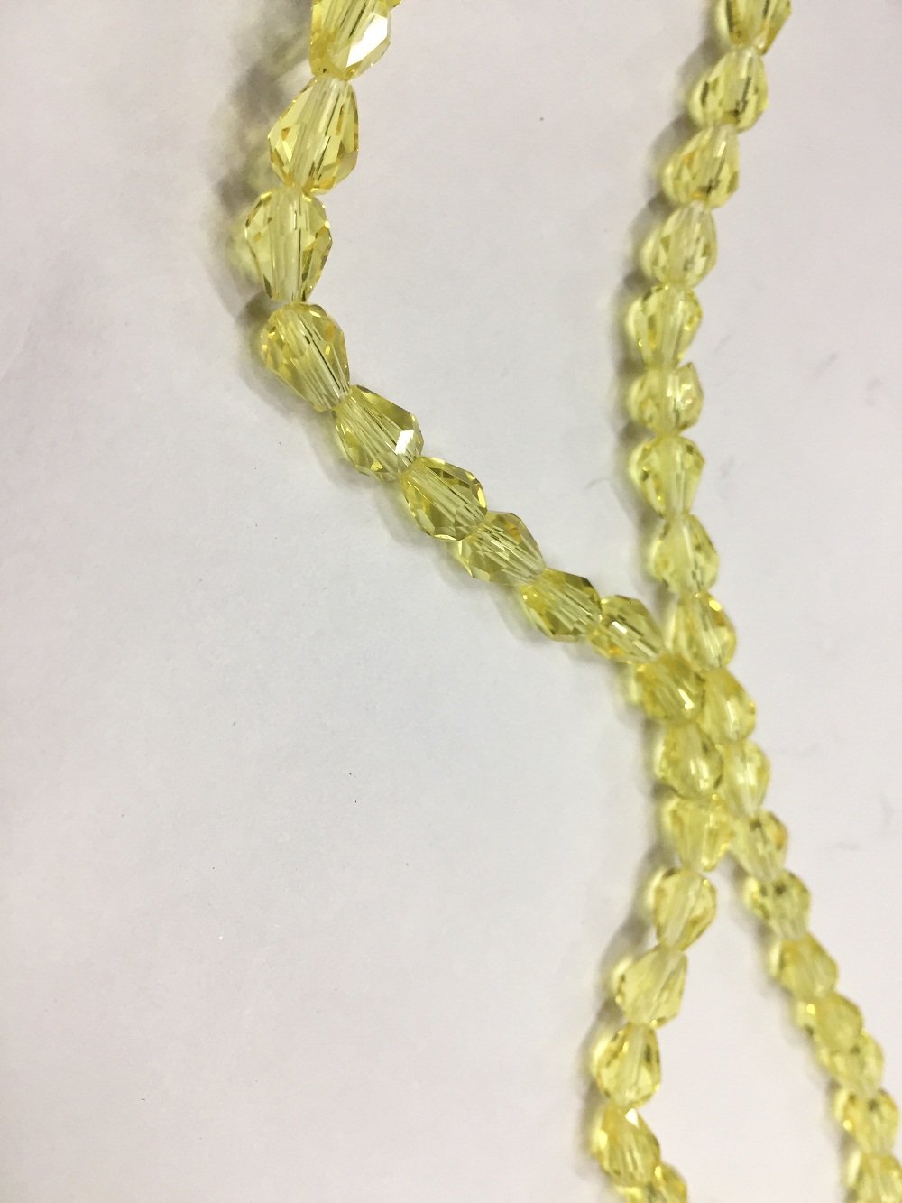 yellow-transparent-drop-shaped-crystal-glass-beads