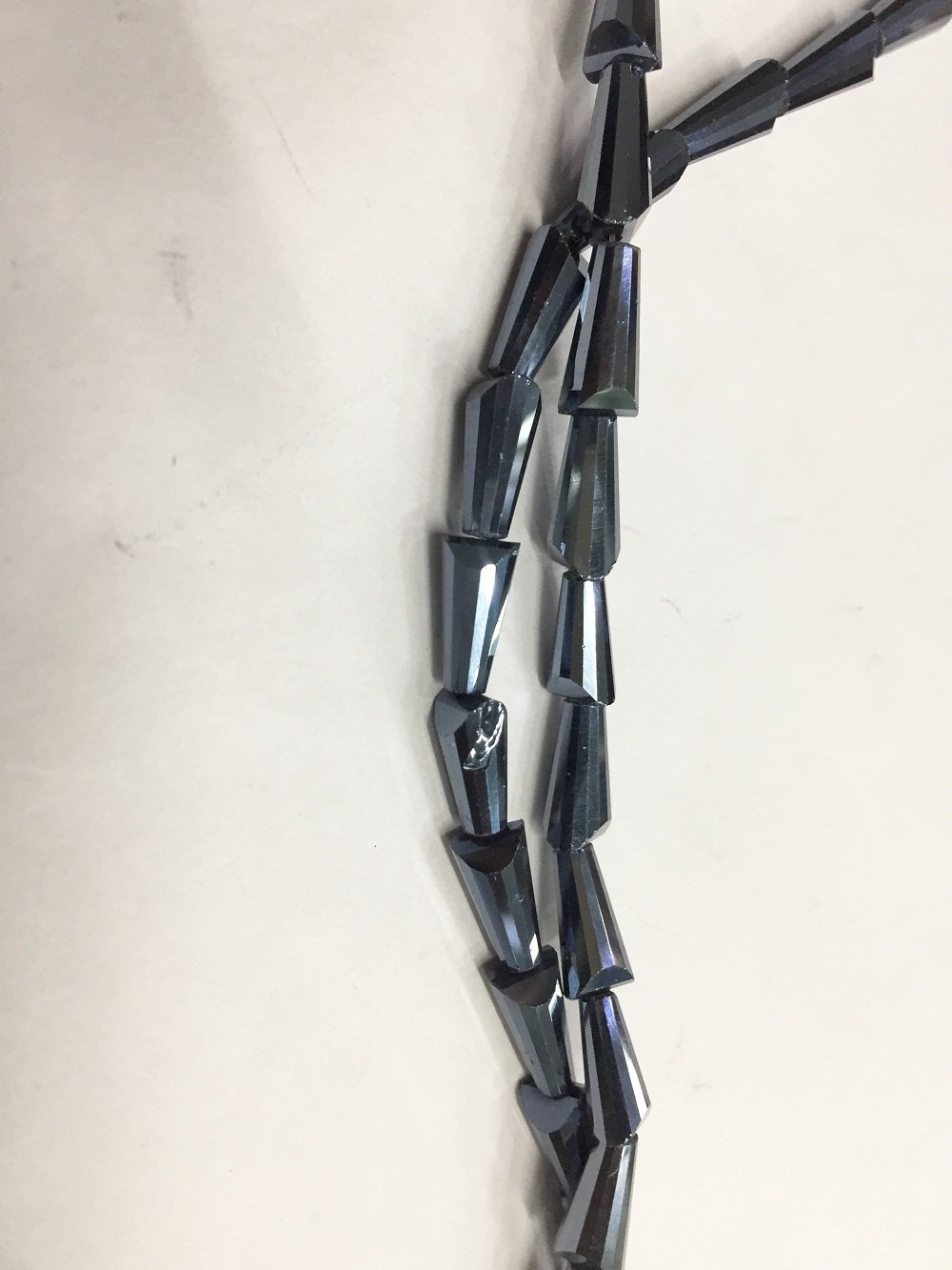 gunmetal-transparent-pencil-shaped-crystal-glass-beads