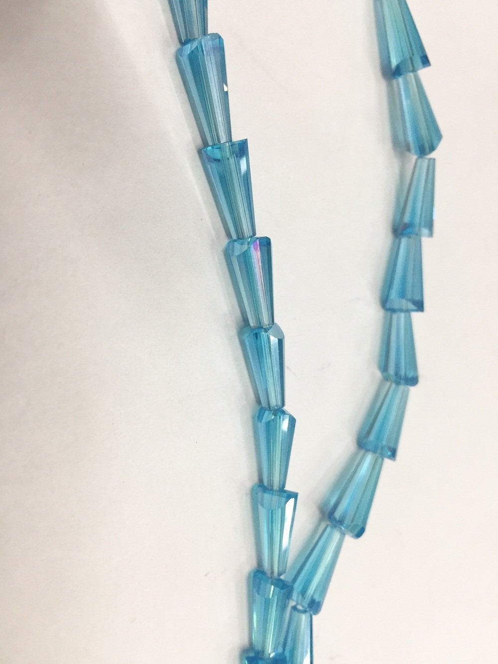 light-blue-transparent-pencil-shaped-crystal-glass-beads