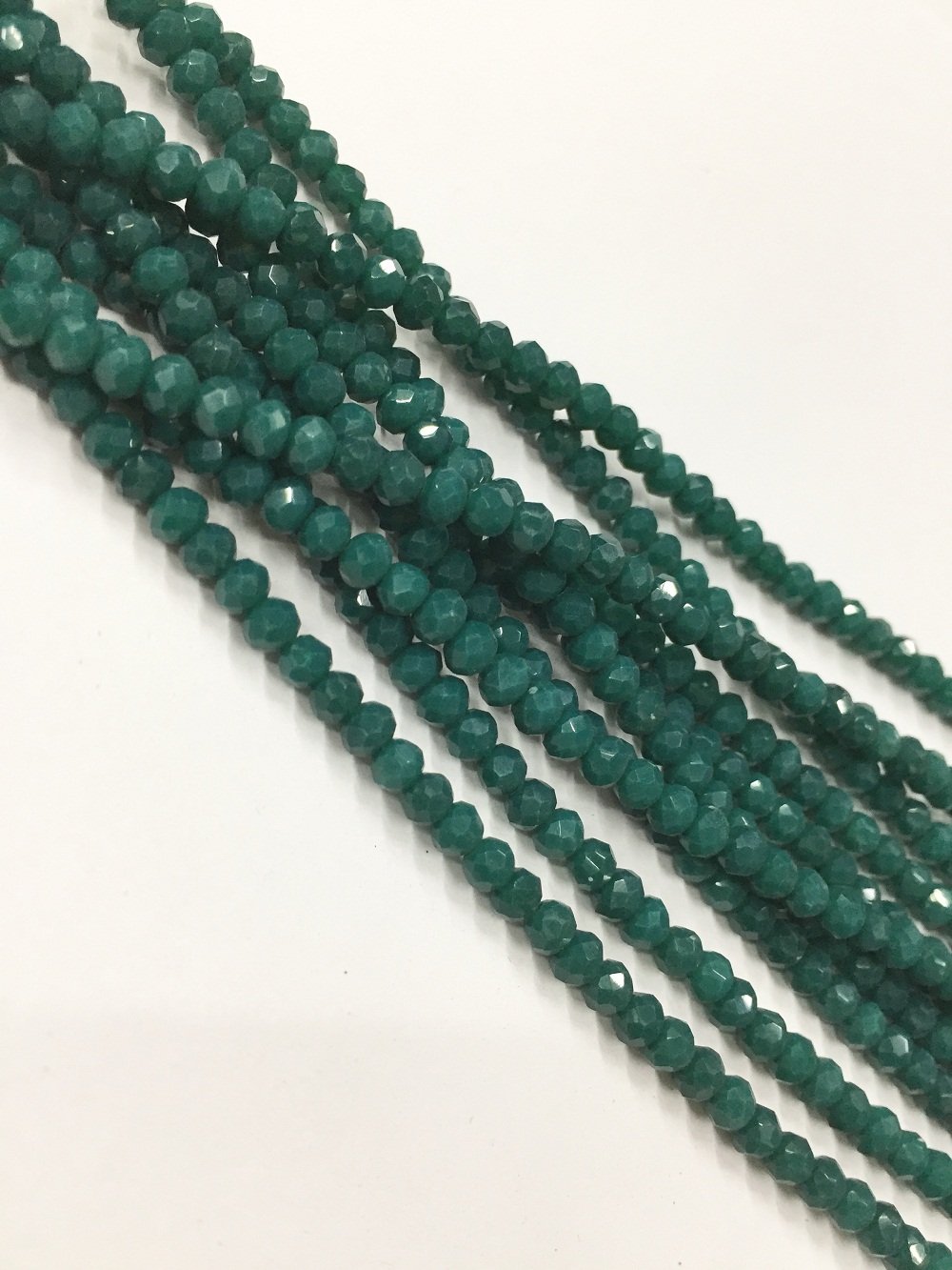 dark-green-opaque-tyre-crystal-glass-beads