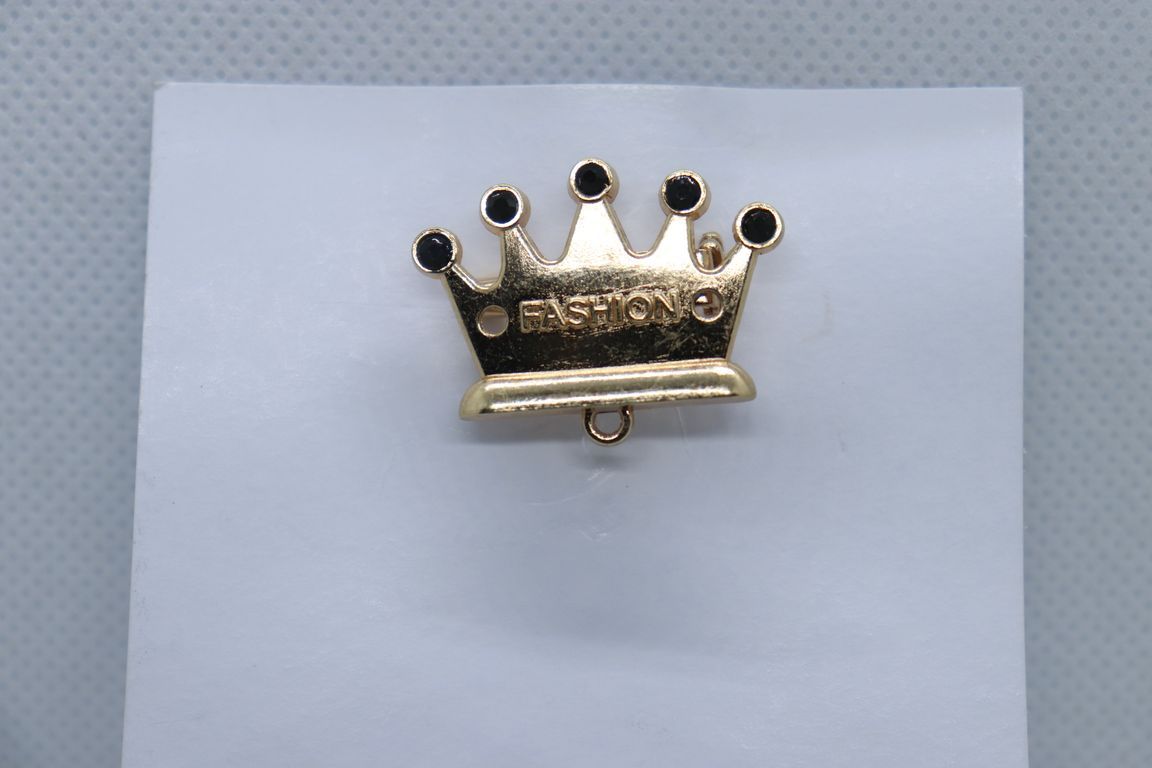 golden-crown-with-black-stone-imitation-jewellery-lapel-pin