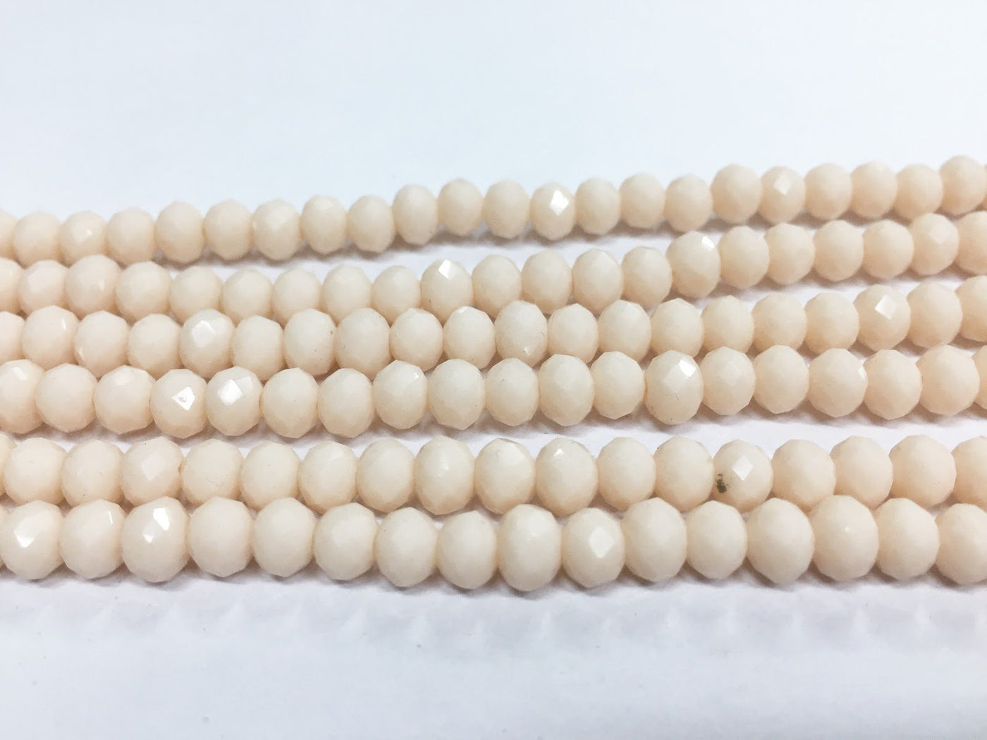 cream-peach-opaque-tyre-crystal-glass-beads