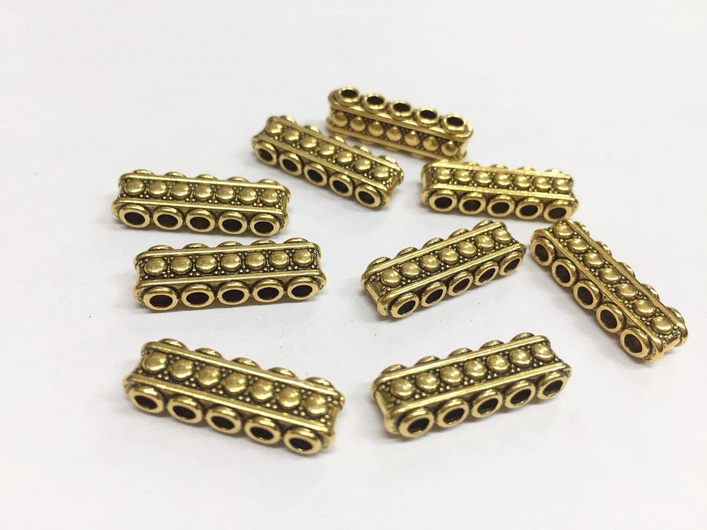 five-hole-golden-designer-metal-jewellery-making-material