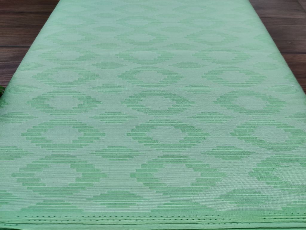 light-green-self-textured-brasso-fabric