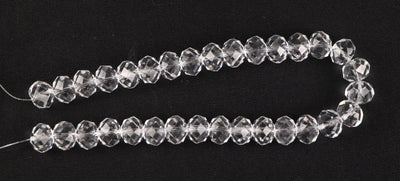 faceted-spherical-glass-beads-10x14-mm