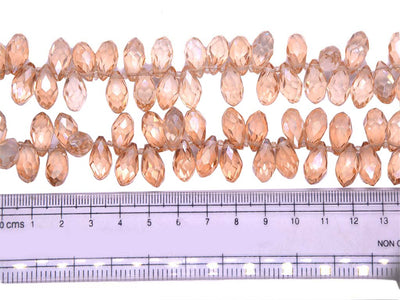 peach-faceted-conical-crystal-beads