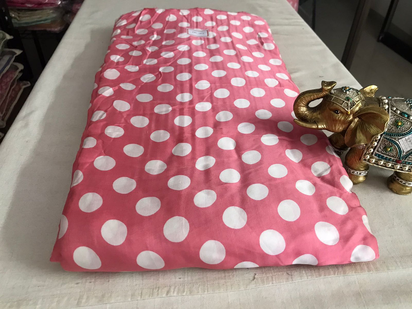white-polka-dots-pink-modal-satin-fabric