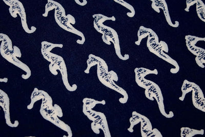 navy-blue-white-seahorses-printed-pure-cotton-rayon-fabric