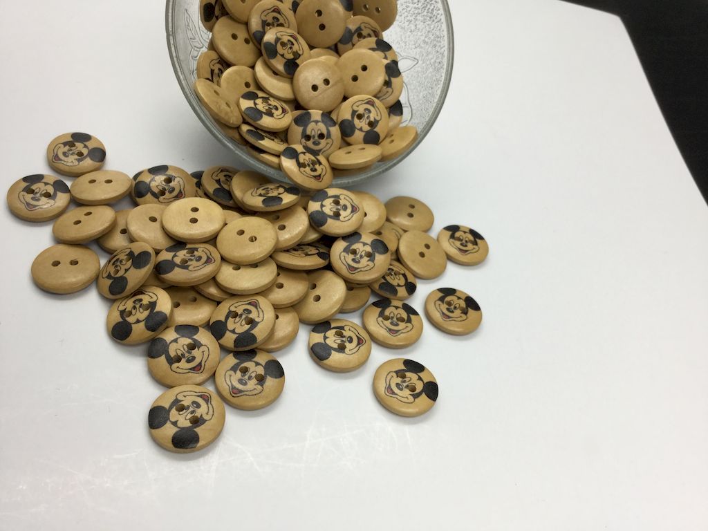 wooden-round-button-with-mickey-design-on-it