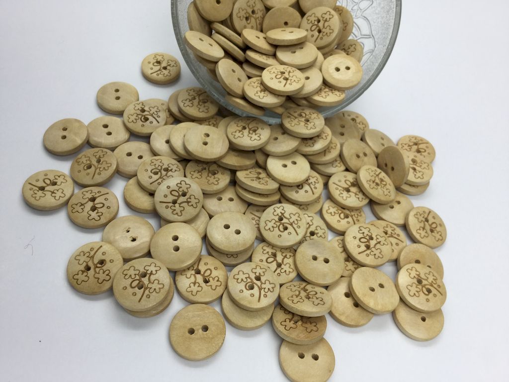 round-wooden-button-with-flower-design-on-it-to-add-beauty-to-your-garments-and-art-and-craft