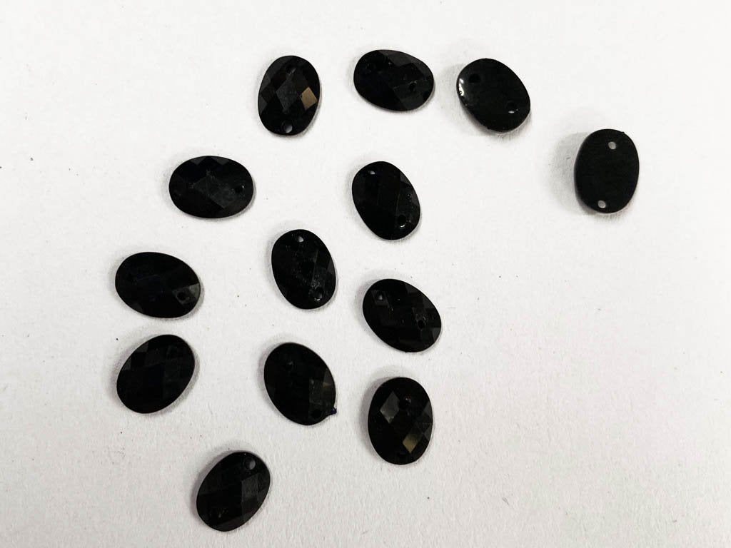 black-oval-2-hole-plastic-beads-8x6-mm