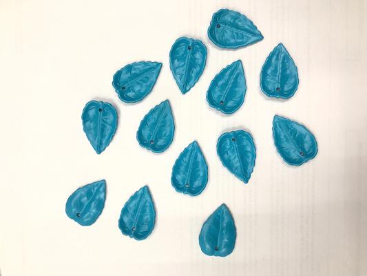 light-blue-leaf-2-hole-plastic-stones-20x28-mm