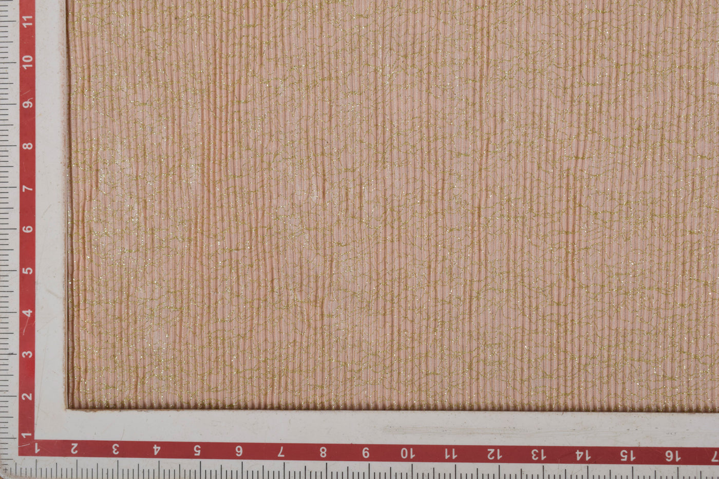 Peach Pleated Zari Knit Fabric