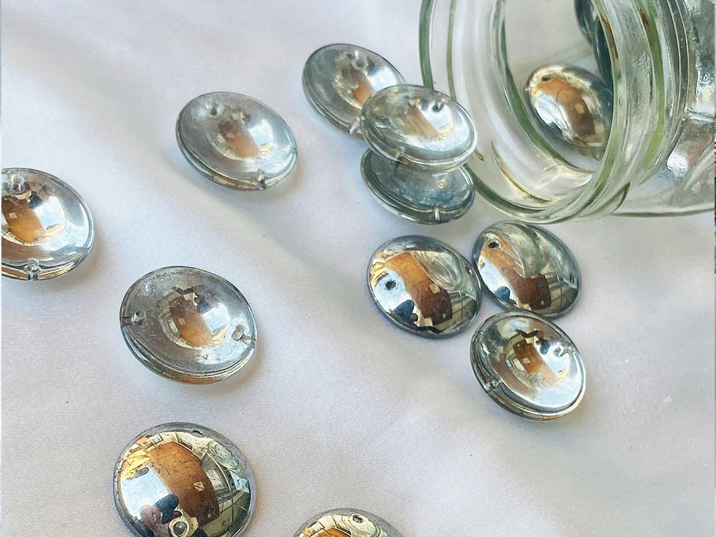 silver-circular-metallic-glass-stones