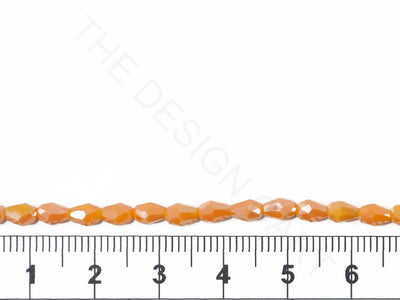 Lustrous Light Orange Opaque Drop / Briolette Crystal Beads | The Design Cart (4079157280802)