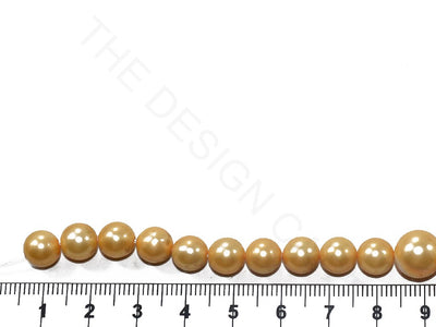 Golden Round Shell Pearls (8 mm to 12 mm) | The Design Cart (3785193848866)
