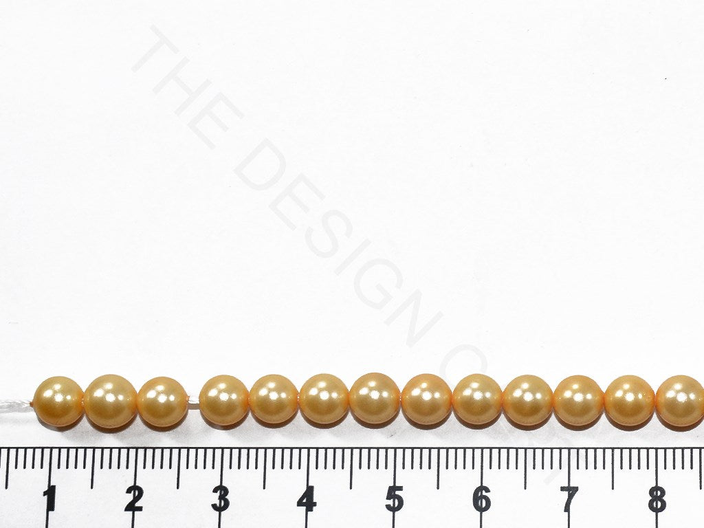 Golden Round Shell Pearls (6mm) | The Design Cart (3785194471458)