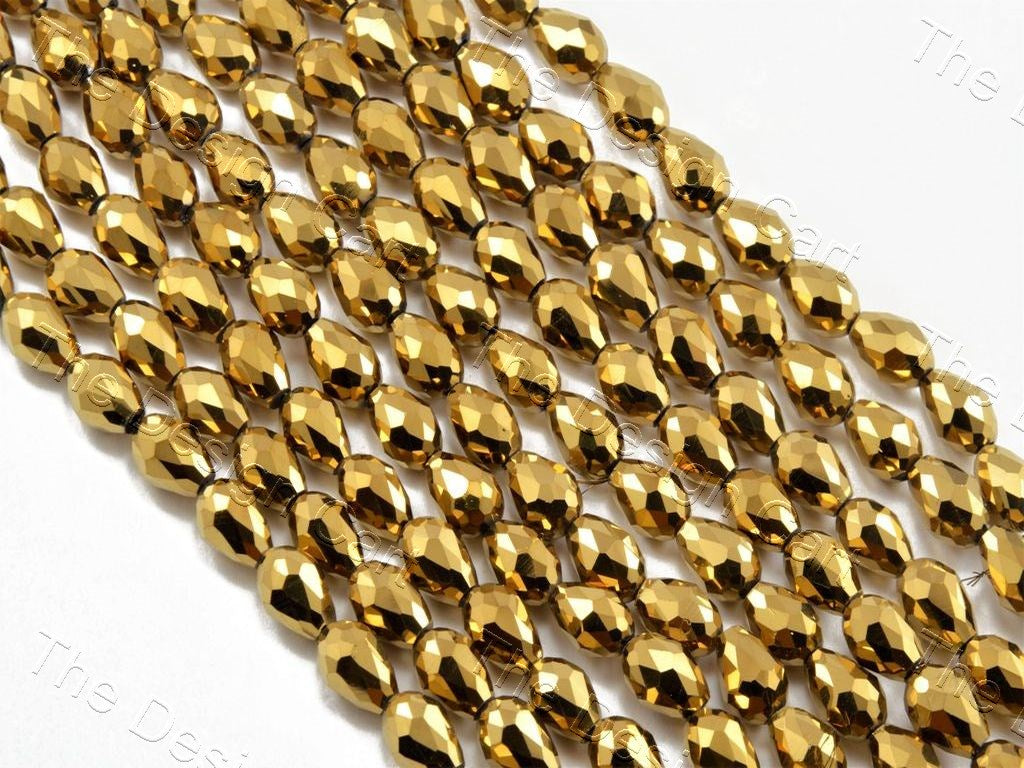 drop-golden-metallic-faceted-crystal-beads (11526459603)