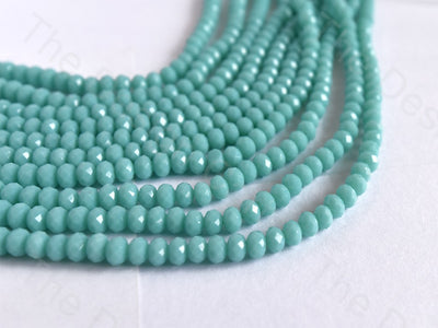 tyre-light-sea-green-opaque-faceted-crystal-beads (11014937875)