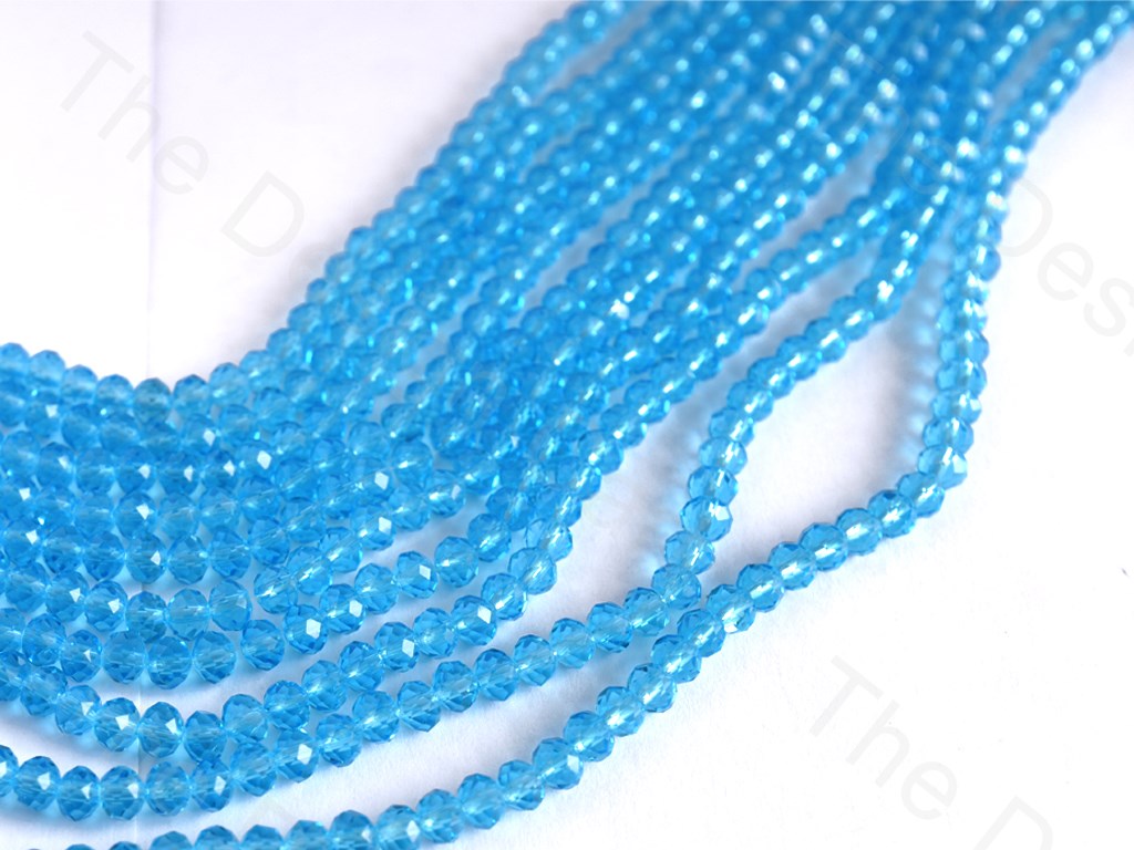 Aqua Blue Transparent Rondelle / Tyre Faceted Crystal Beads | The Design Cart (1557073231906)