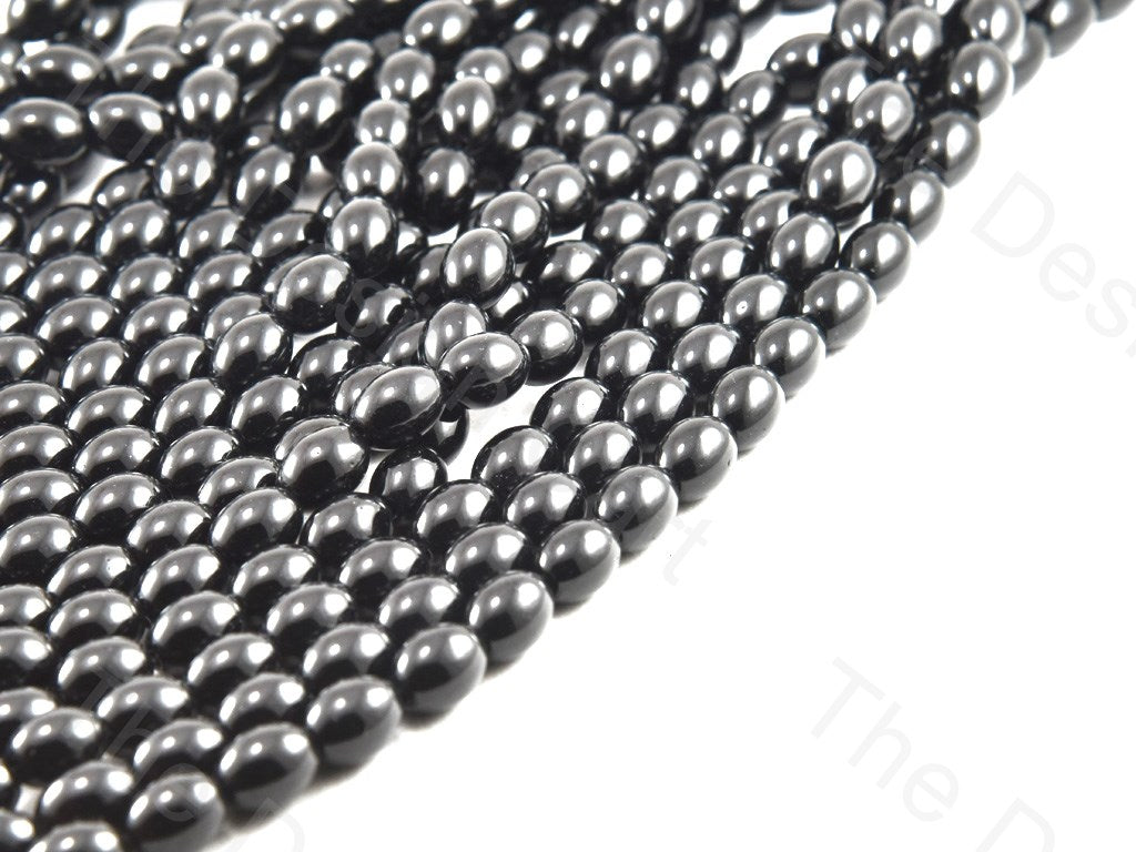 black-oval-glass-pearl (12421133203)