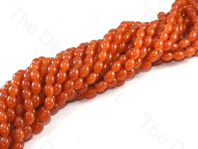orange-oval-glass-pearl (12421133075)