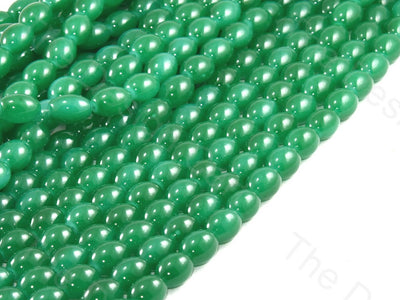 peacock-green-oval-glass-pearl (12421132883)