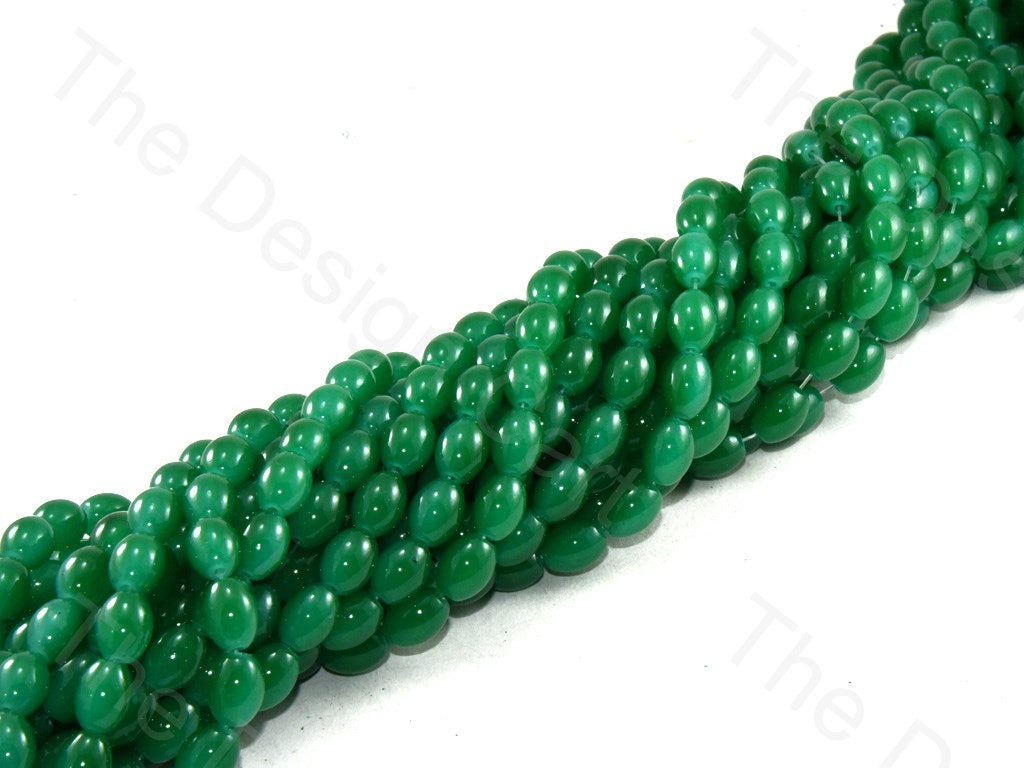 peacock-green-oval-glass-pearl (12421132883)