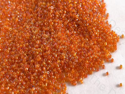 Transparent Rainbow Orange Round Rocailles Seed Beads | The Design Cart (10681649043)