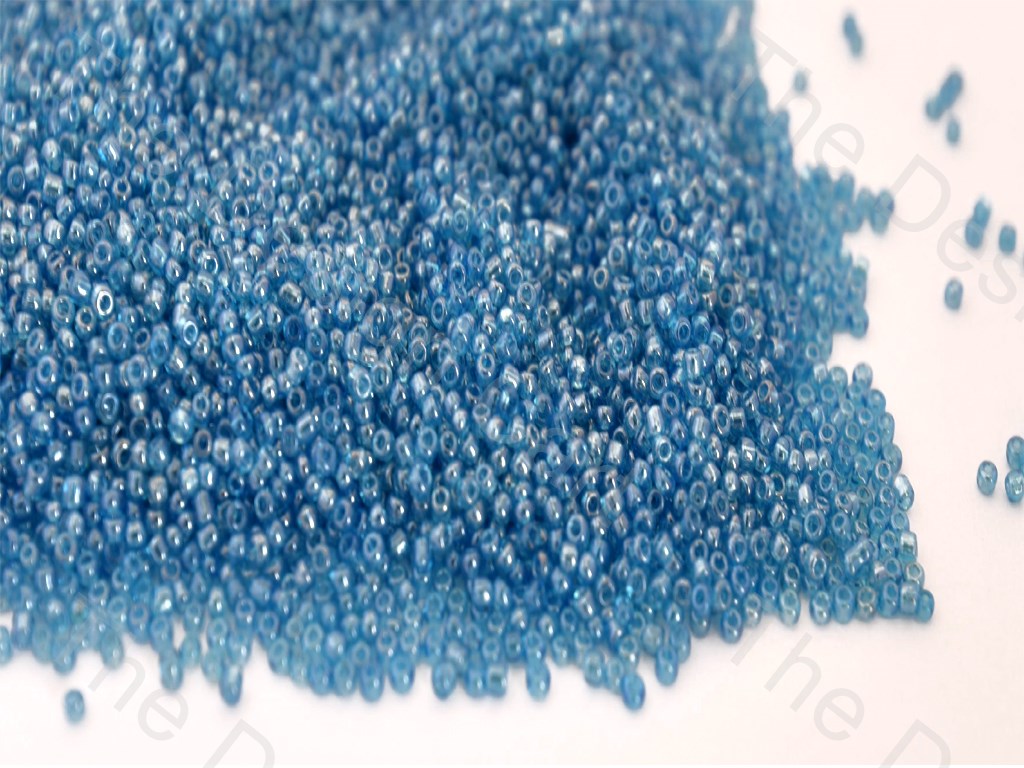 Transparent Luster Turquoise Round Rocailles Seed Beads | The Design Cart (10588329939)