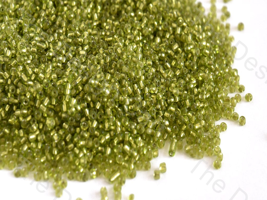 Silverline Peridot / Olive Green Round Rocailles Seed Beads | The Design Cart (10558347795)