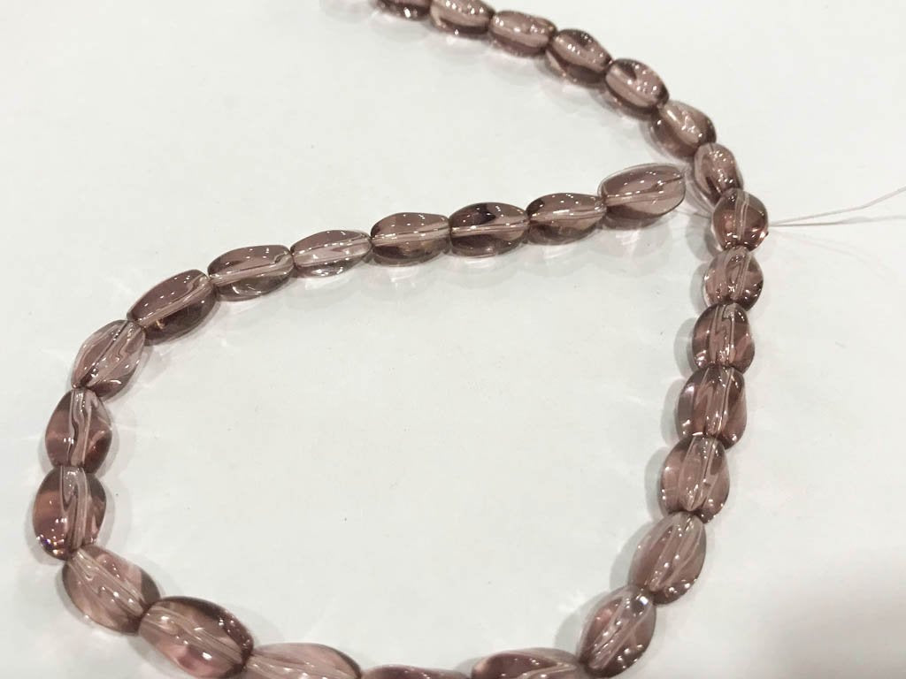 amethyst-purple-transparent-fancy-oval-pressed-glass-beads-8x12-mm