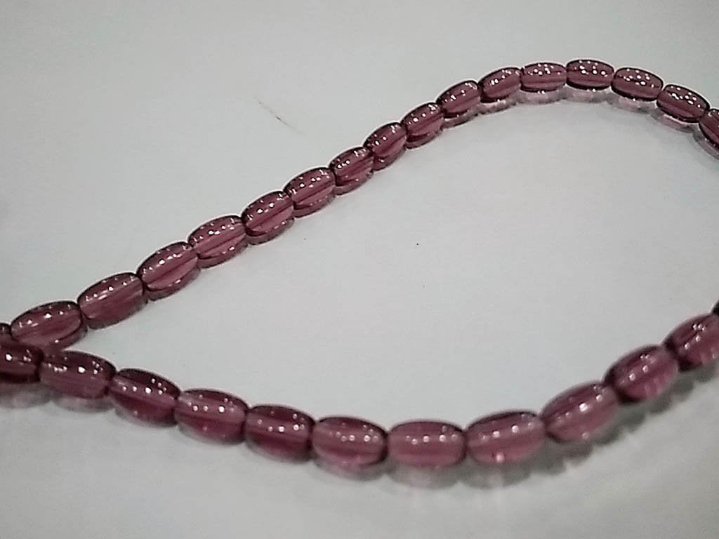 amethyst-purple-transparent-oval-pressed-glass-beads-4x7-mm