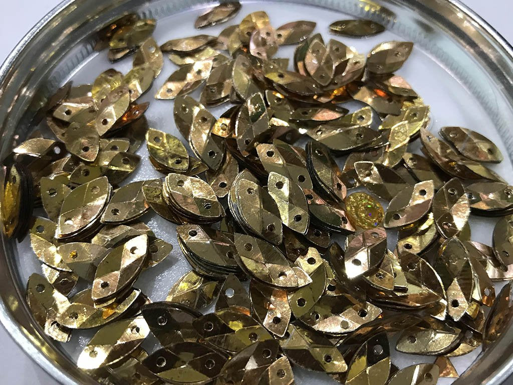 antique-golden-eye-2-hole-plastic-sequins