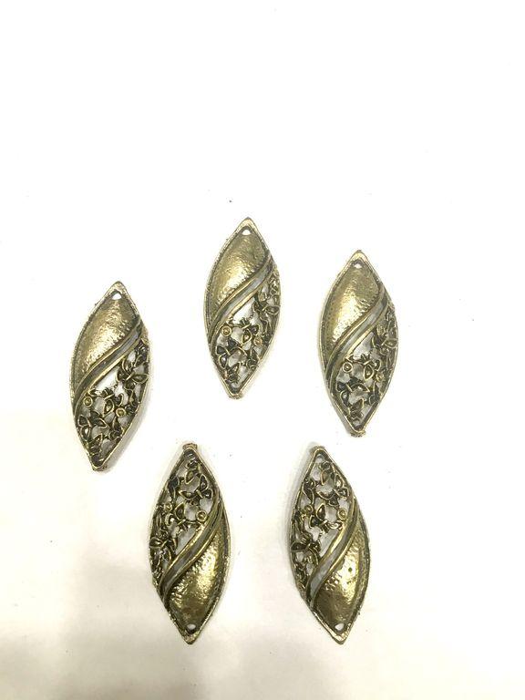 antique-golden-eye-shaped-metal-piece