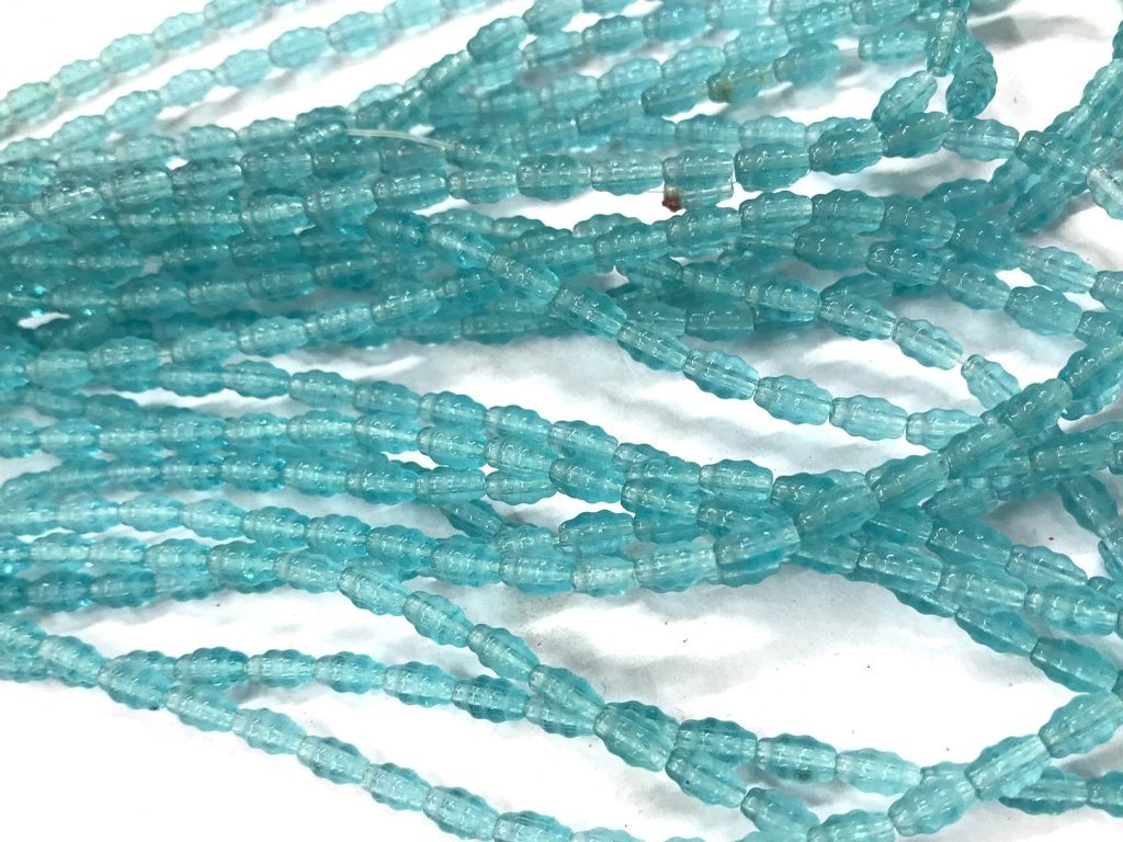 aqua-blue-fancy-oval-pressed-glass-beads
