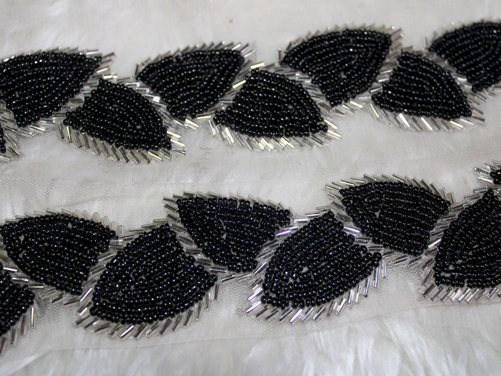 black-and-silver-leaf-shaped-handwork-lace